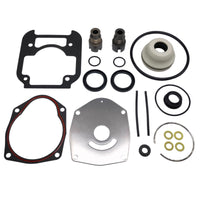 photo of JLM Marine seal kit 26-8m0142979 with black gaskets, two metal cylinders, and various black and gold rings on a white background