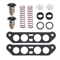 photo of jlm marine thermostat kit for johnson evinrude v4 crossflow outboard engines 65-80 jet 85-140 hp 18-3673 with two thermostats, springs, plastic connectors, rubber seals, metal rings, and two gaskets with multiple holes