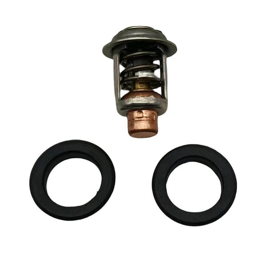 photo thermostat honda 19300-zw9-003 metallic housing spring mechanism two black rubber gaskets circular isolated white background