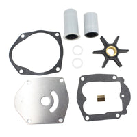 photo of JLM Marine water pump impeller kit 821354a2, black impeller with six flexible blades and brass hub, silver metal plate with hexagonal outer shape, and two black gaskets