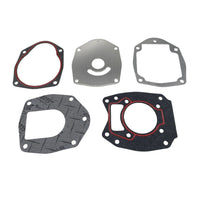 photo mercury water pump impeller kit 47-43026q02 set of five gaskets with varied shapes and colors including irregular oval dark border red inner seal, thin metallic silver shield-like with cut-out, rectangular silver, large black with red seal, and grey patterned with keyhole opening 6015