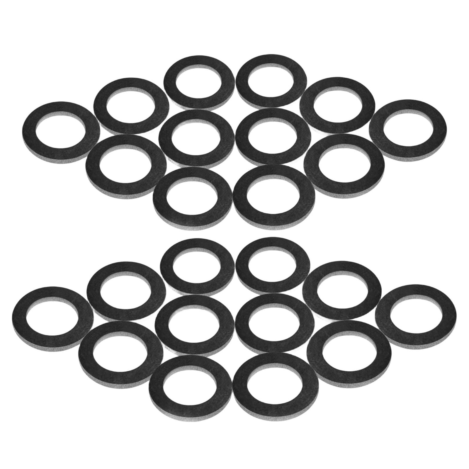 photo of seven black drain screw gaskets for mercury mercruiser and johnson evinrude lower unit 12-19184 in plus sign pattern
