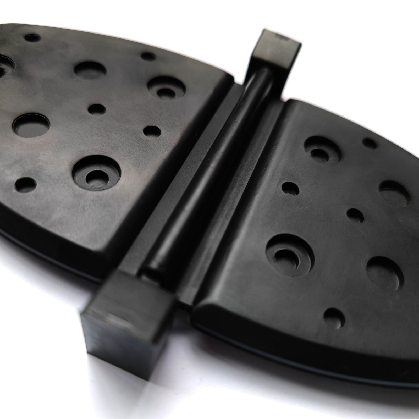exhaustive-water-shutter JLM Marine 807166a2 black plastic with textured circular indentations and mounting protrusions