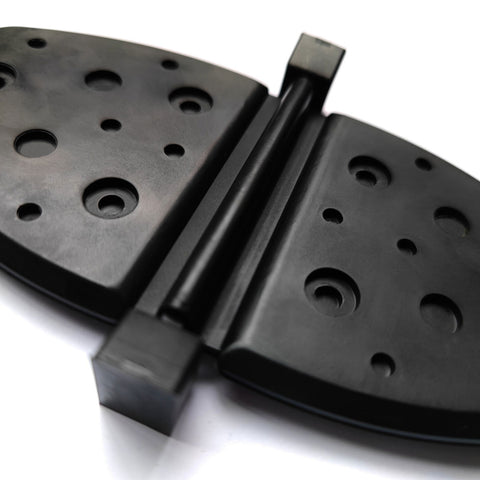 exhaustive-water-shutter JLM Marine 807166a2 black plastic with textured circular indentations and mounting protrusions