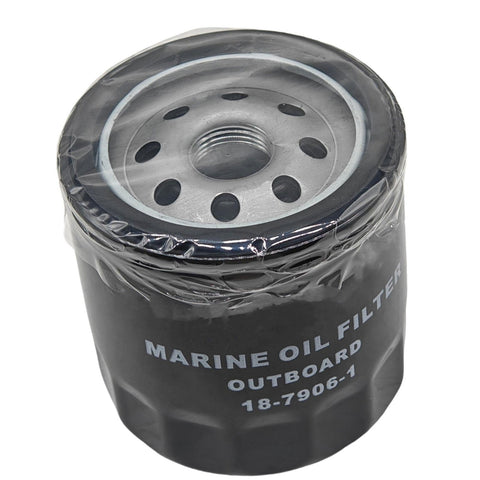 photo of JLM Marine oil filter 18-7906-2 black cylindrical textured with metal threaded base and white lettering MARINE OIL FILTER, packaged in clear plastic