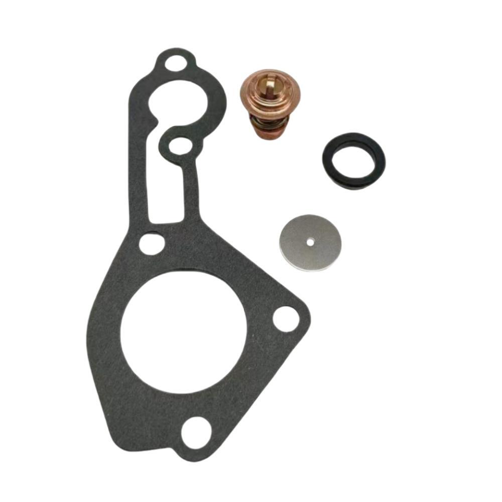 photo of JLM Marine thermostat kit for mercury mariner 70 75 80 90 115hp 8032 803061t1 140-deg, dark gray irregular gasket with holes, brass thermostat, black rubber seal, metallic gray disc