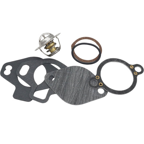 photo of jlm marine thermostat repair kit 807252q4 for mercruiser v6 v8 sterndrive motors showing silver brass thermostat with coil spring and flanged top bottom, brown ribbed ring, black rubber ring, and gray composite gaskets with cutouts and metal grommets