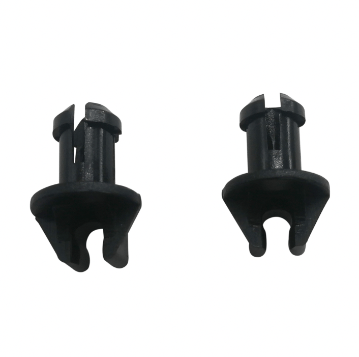 photo of two black plastic throttle linkage swivel bushings for mercury mercruiser 23-932481, showing cylindrical stems, split tops, conical bases, and U-shaped openings