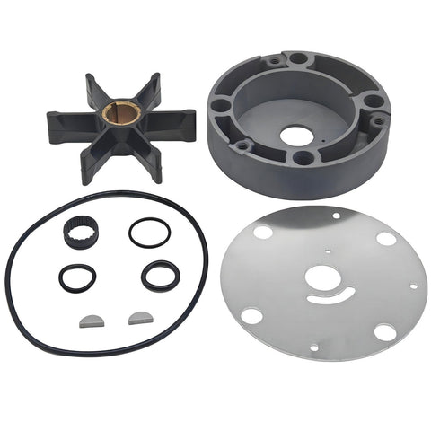 photo of JLM Marine water pump repair kit for OMC stringer drives 983218, featuring a six-bladed black rubber impeller with brass hub, grey plastic housing, O-rings, seals, keys, and a metal base plate