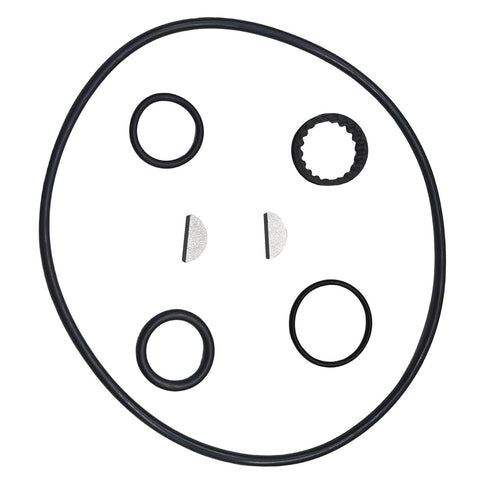 photo of JLM Marine water pump repair kit for OMC Stringer drives 983218 with black O-rings including one with serrated inner edge and two textured metallic discs against white background